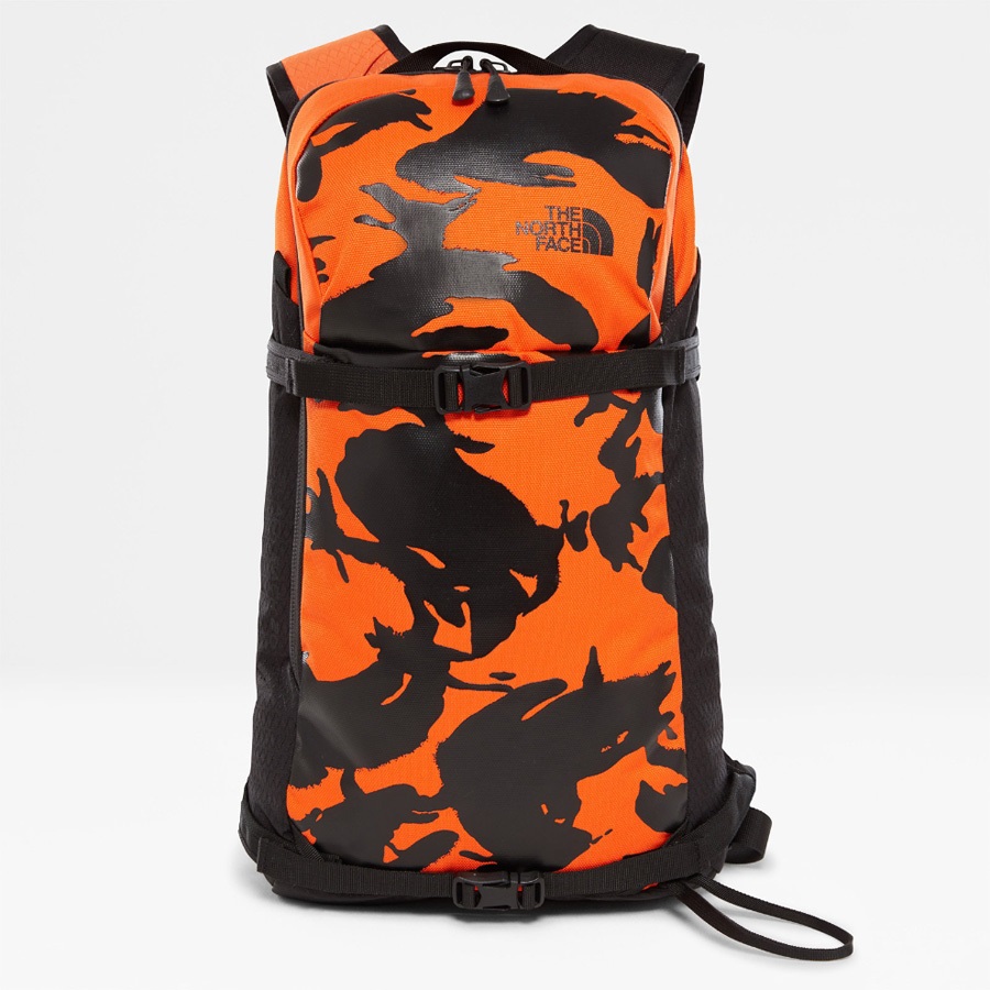 orange and black north face backpack